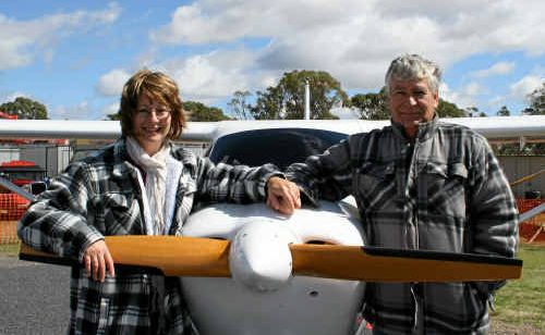 Gwen and John Tyburczy with the aircraft they bought a month ago. Gwen and John Tyburczy with the aircraft they bought a month ago.